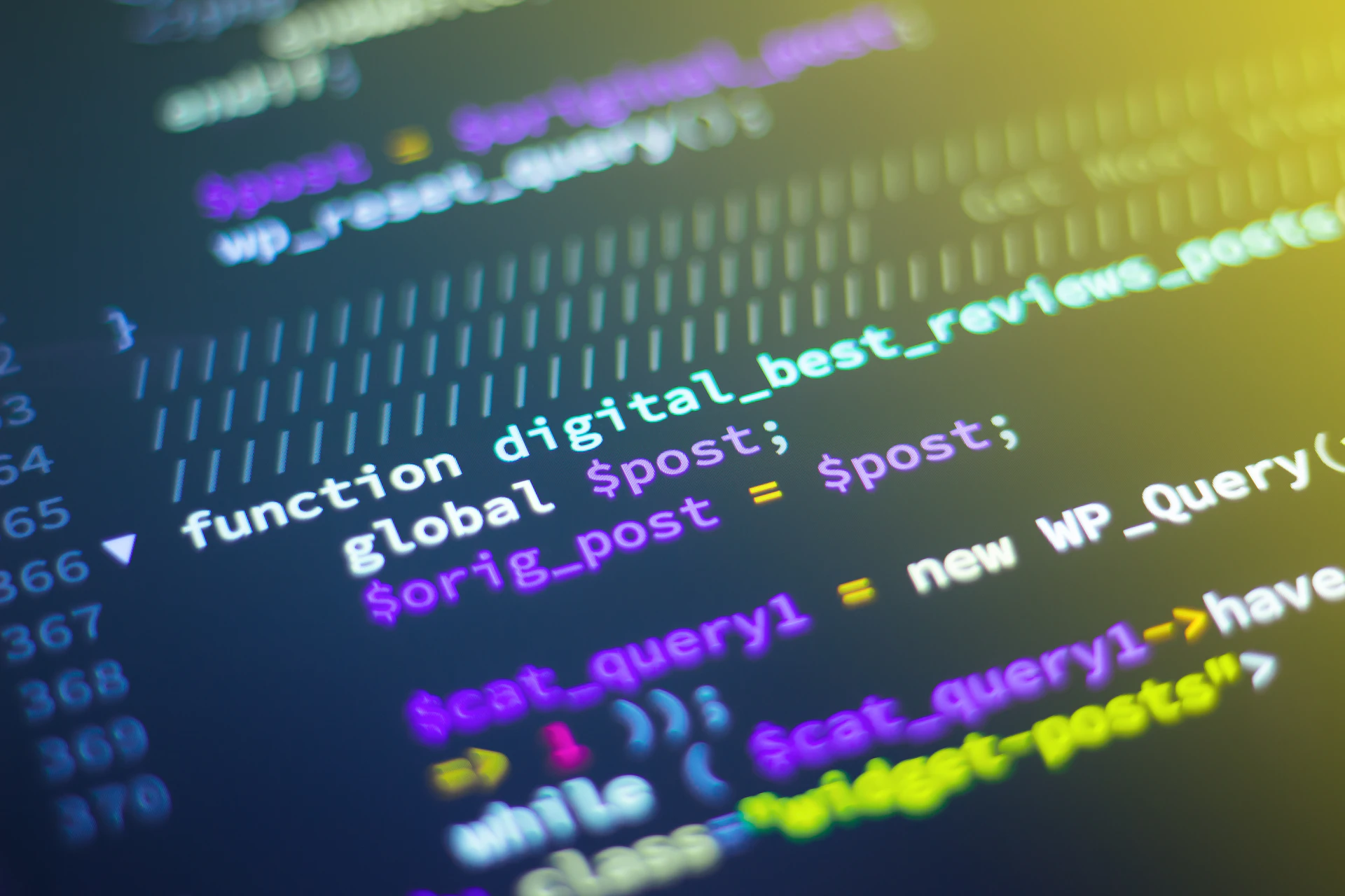 Multiple monitors displaying code - modern AI-accelerated development environment