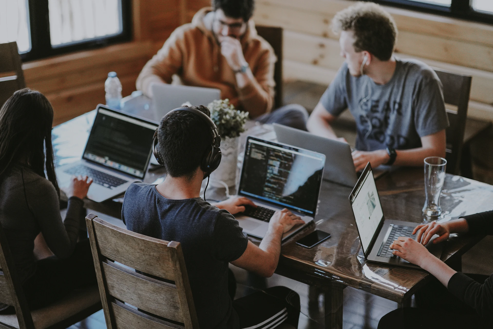 Diverse team of developers collaborating in modern office